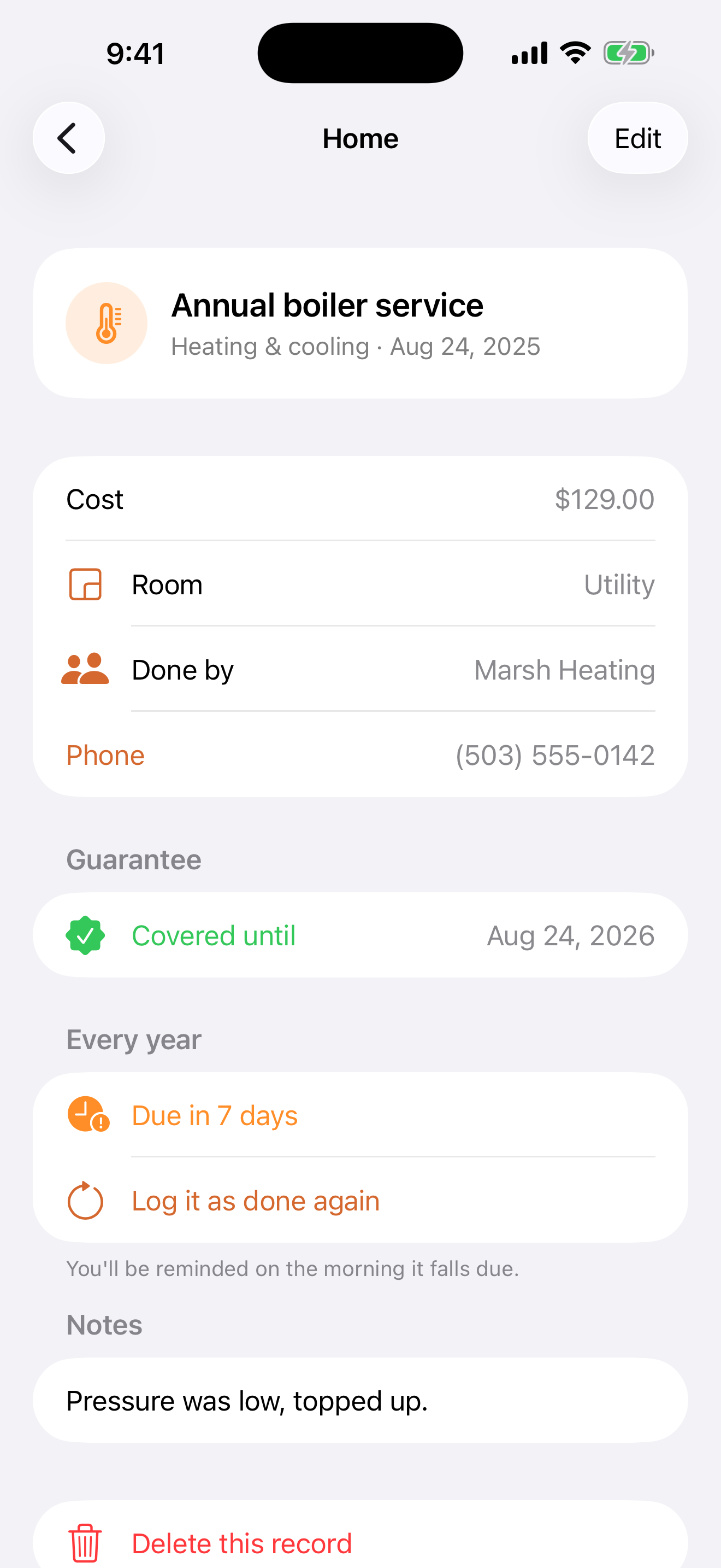 The detail screen for Annual boiler service, heating and cooling, dated 24 August 2025. It shows a cost of $129, the room Utility, done by Marsh Heating with a tappable phone number, a green Covered until 24 August 2026 guarantee, an Every year section reading Due in 7 days with a Log it as done again button, and a note that the pressure was low and was topped up.