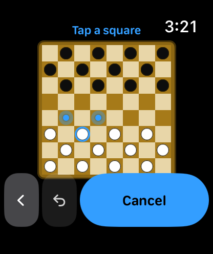 A piece picked up, with its two legal destinations shown as blue dots.